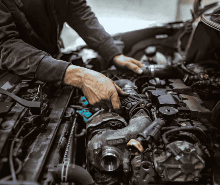 a mechanic opened car bonnet